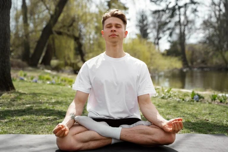 man doing meditation in morning